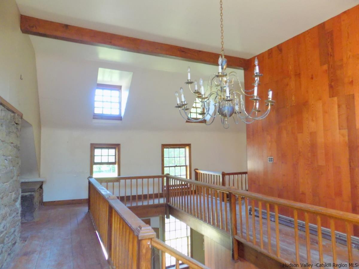 2733 Highway 209 Kingston, NY 12401 - Photo 19 of 34 a view of a dining room with furniture and chandelier