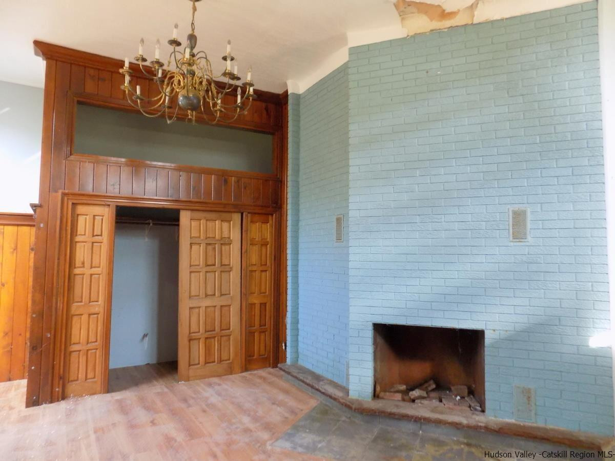 2733 Highway 209 Kingston, NY 12401 - Photo 25 of 34 a view of a house with a balcony and a fireplace