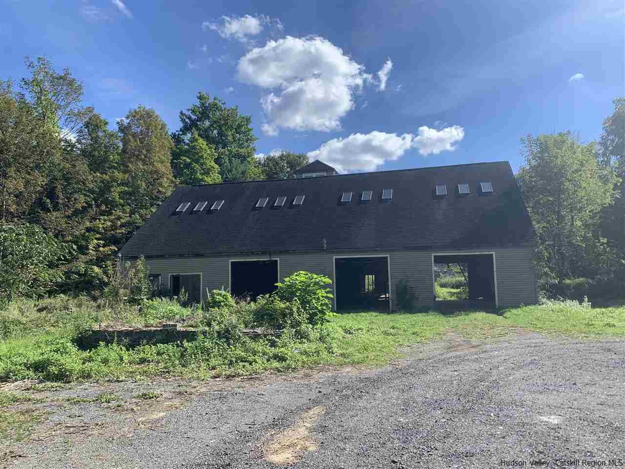 2733 Highway 209 Kingston, NY 12401 - Photo 28 of 34 a front view of a house with a garden