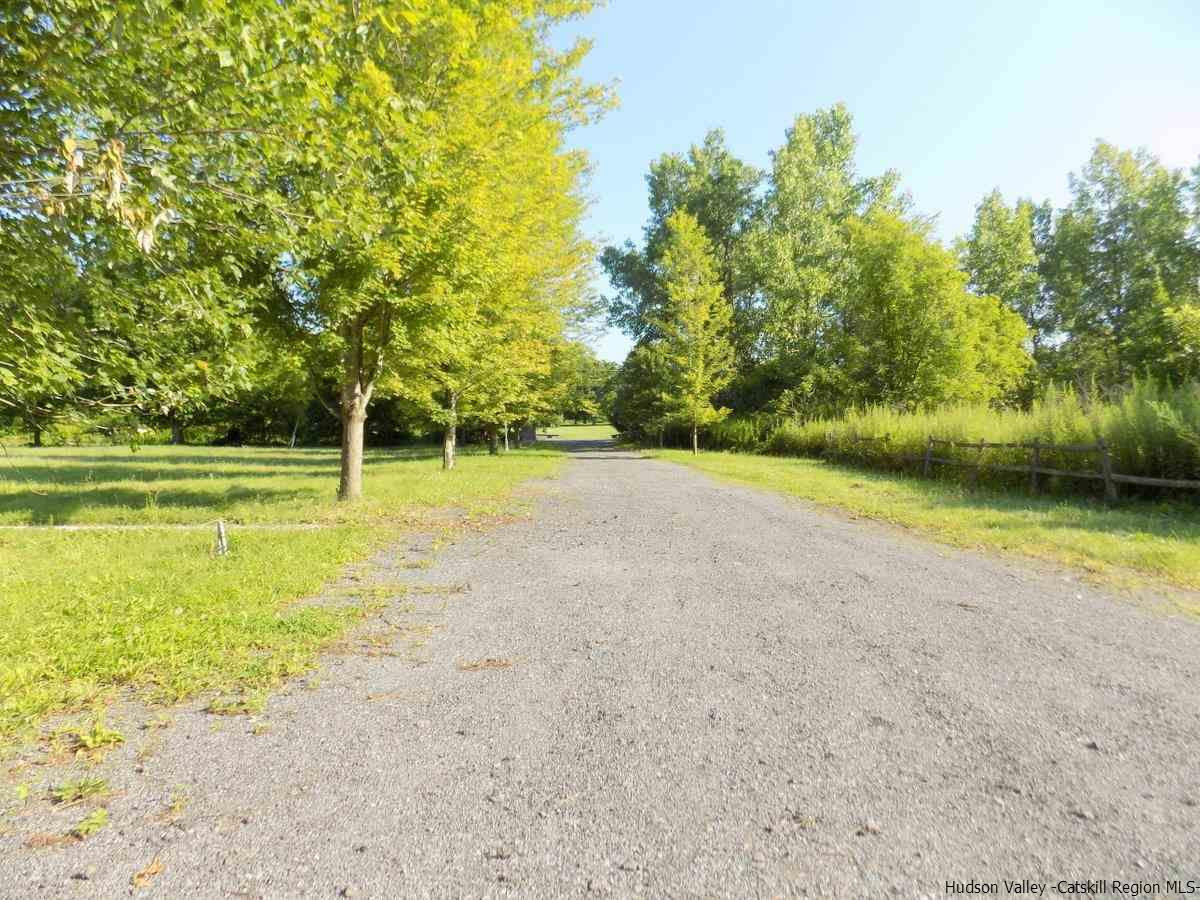 2733 Highway 209 Kingston, NY 12401 - Photo 33 of 34 a view of a swimming pool with an outdoor space and seating area