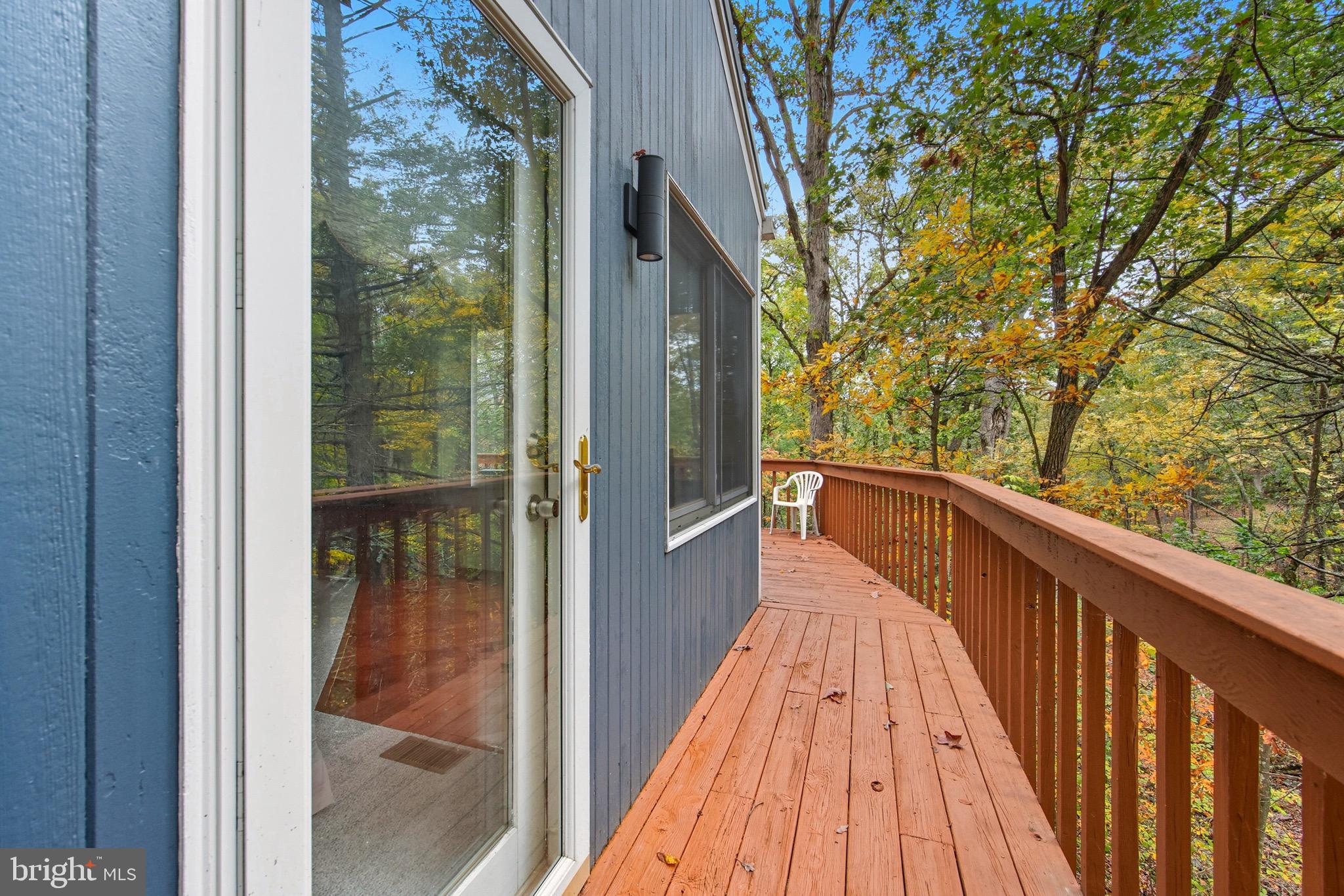 16 Spruce Hollow Road Basye, VA 22842 - Photo 11 of 50 a view of balcony with wooden floor and outdoor space