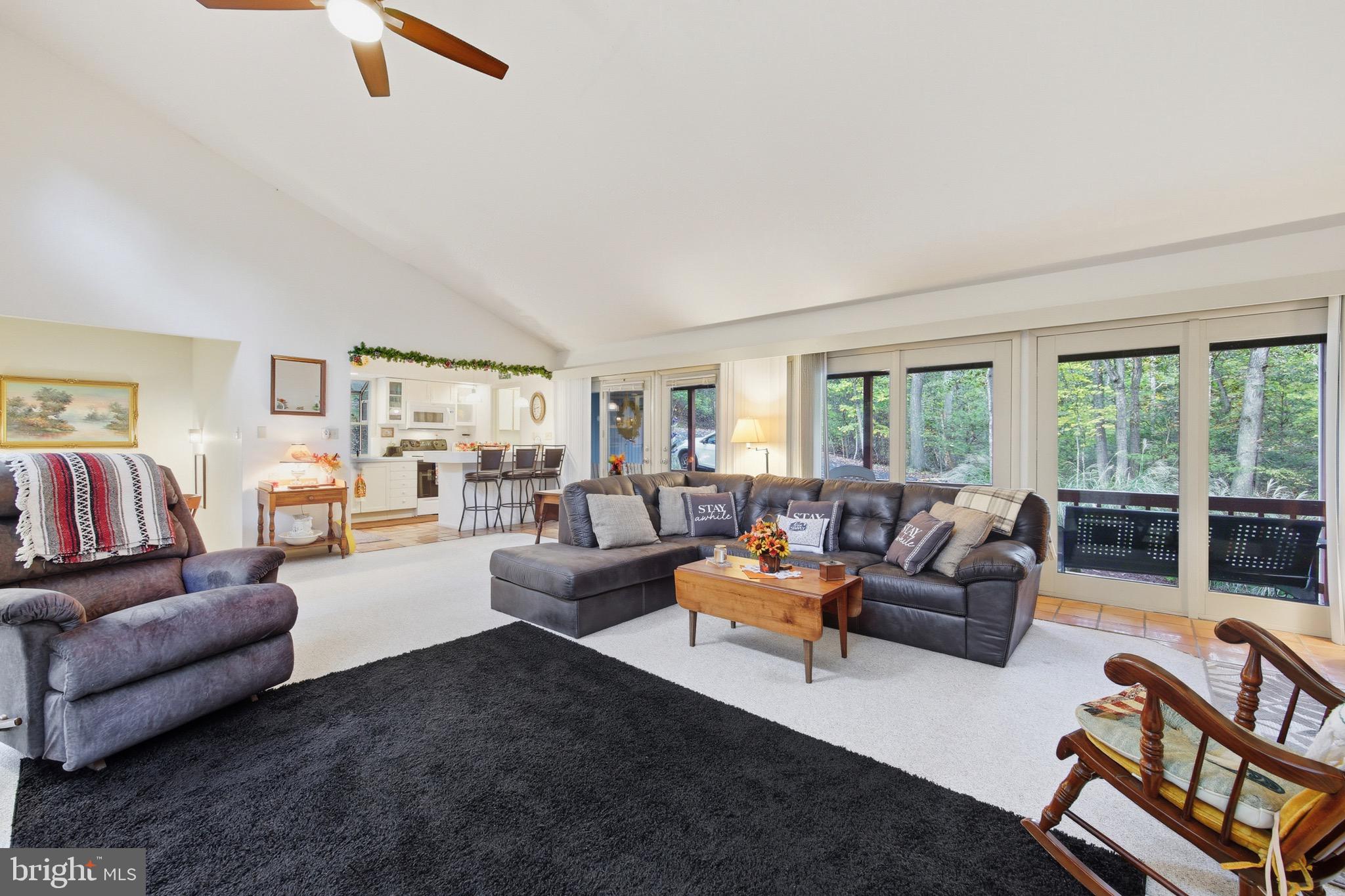 16 Spruce Hollow Road Basye, VA 22842 - Photo 14 of 50 a living room with furniture and a large window