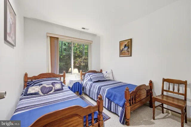 a bathroom with a sink a toilet and vanity