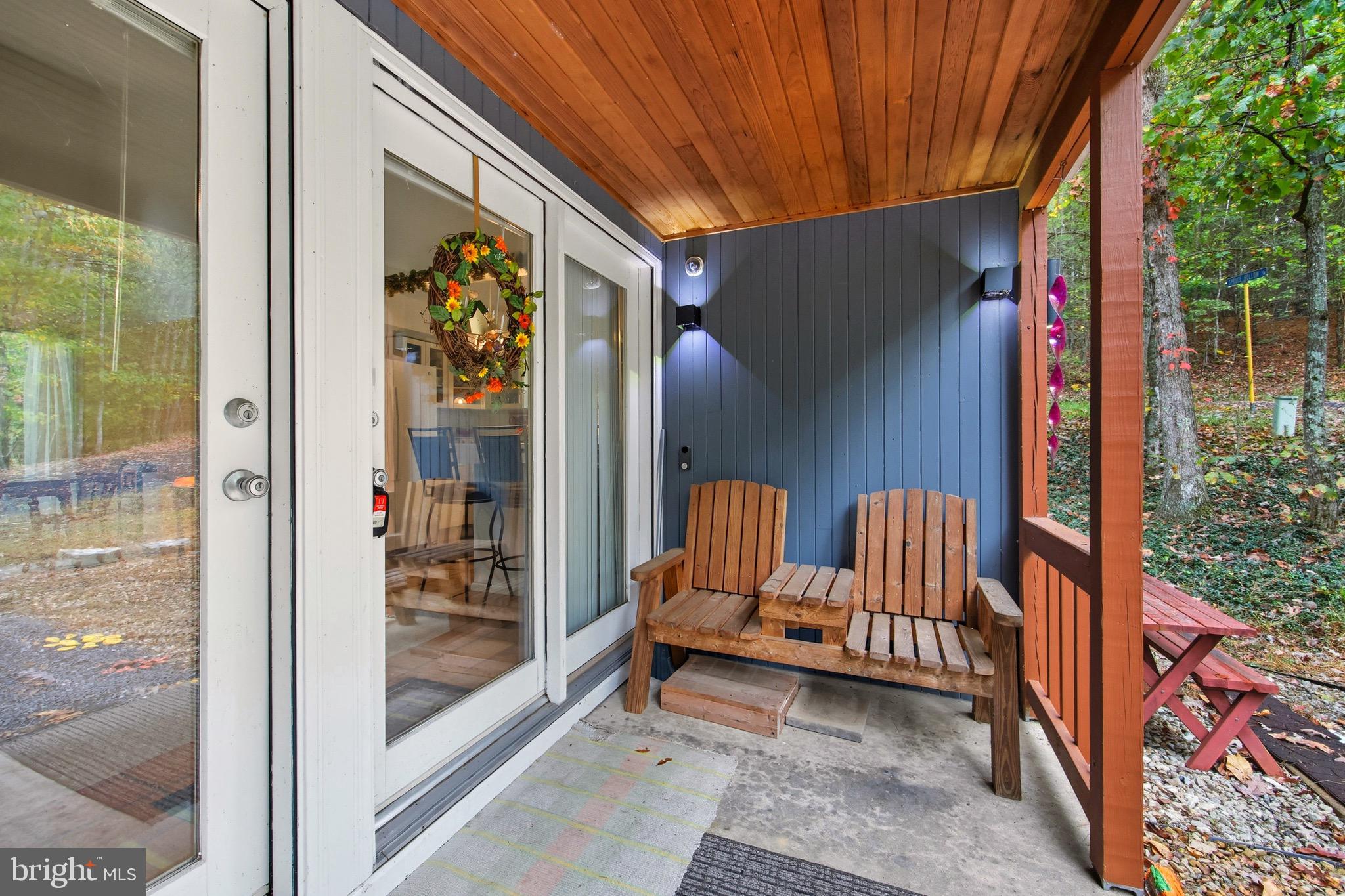 16 Spruce Hollow Road Basye, VA 22842 - Photo 10 of 50 a view of a porch with furniture