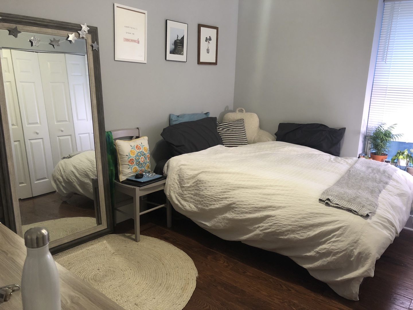 926 West George Street, Unit 3R Chicago, IL 60657 - Photo 3 of 21 a bedroom with a bed and a mirror