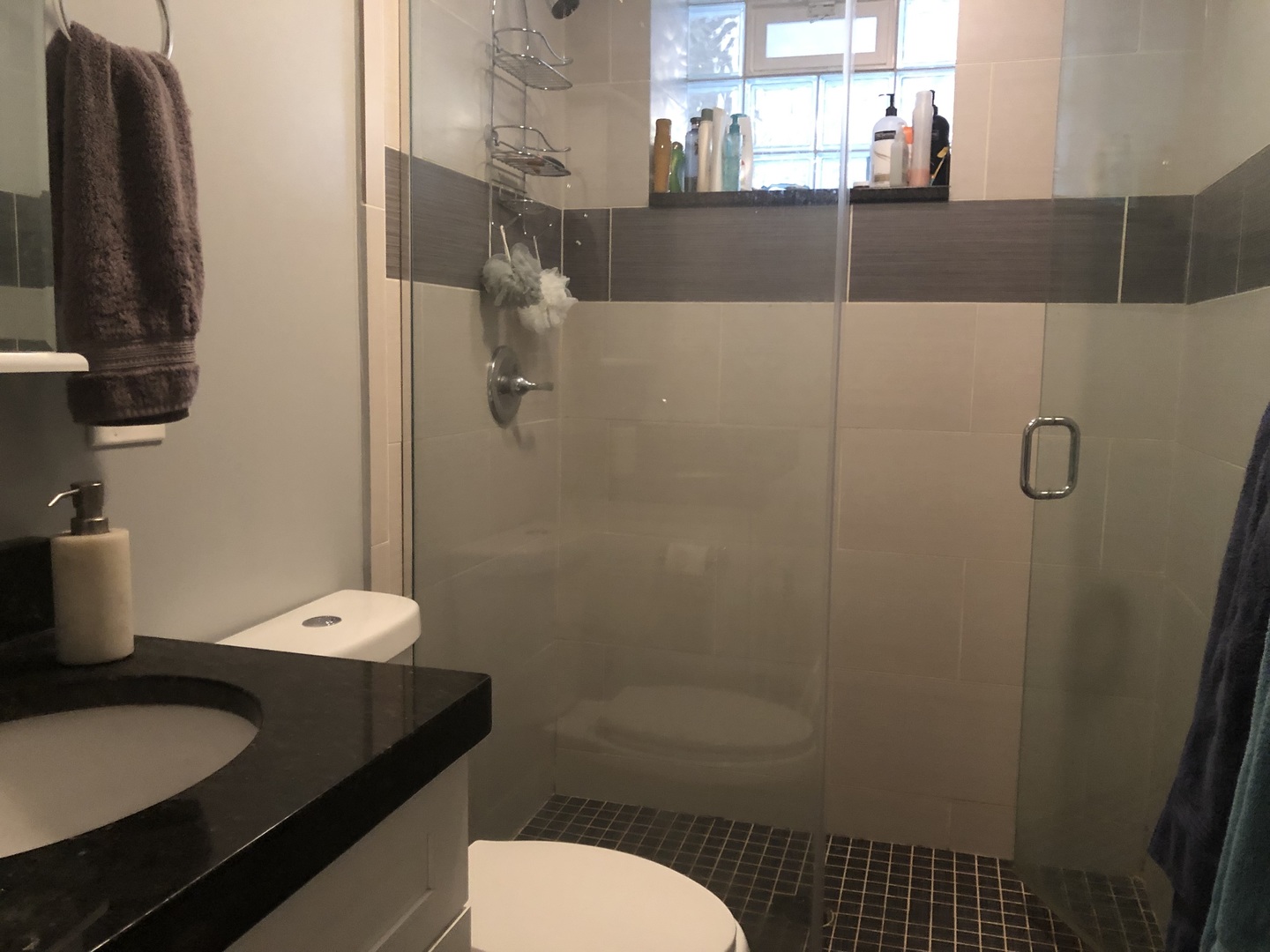 926 West George Street, Unit 3R Chicago, IL 60657 - Photo 4 of 21 a bathroom with a granite countertop sink and a toilet