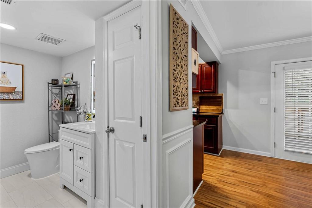 6900 Roswell Road, Unit N5 Atlanta, GA 30328 - Photo 14 of 47 a view of entryway with bathroom and hallway