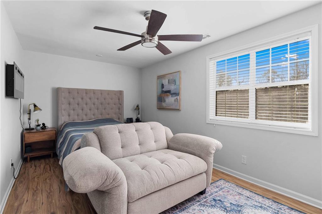 6900 Roswell Road, Unit N5 Atlanta, GA 30328 - Photo 31 of 47 a living room with furniture and a window