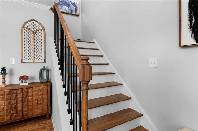 a view of entryway with wooden floor and window