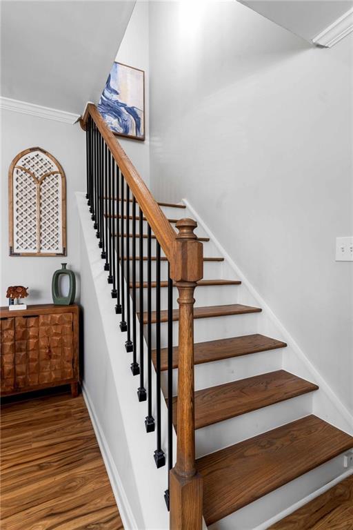 6900 Roswell Road, Unit N5 Atlanta, GA 30328 - Photo 39 of 47 a view of entryway and hall with wooden floor