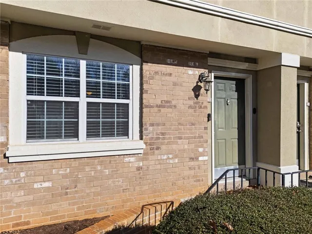 a front view of a house with a window