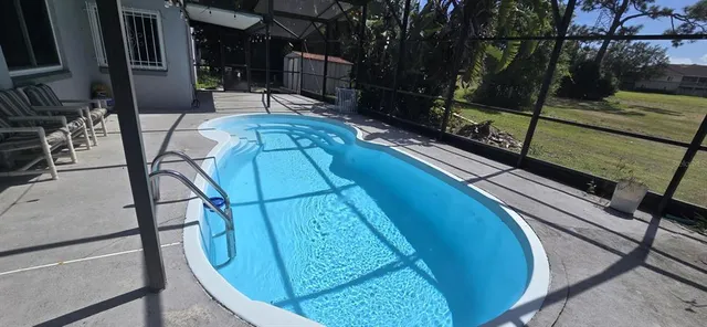 a view of a balcony with chairs