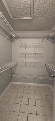 a view of a room with racks on the wall