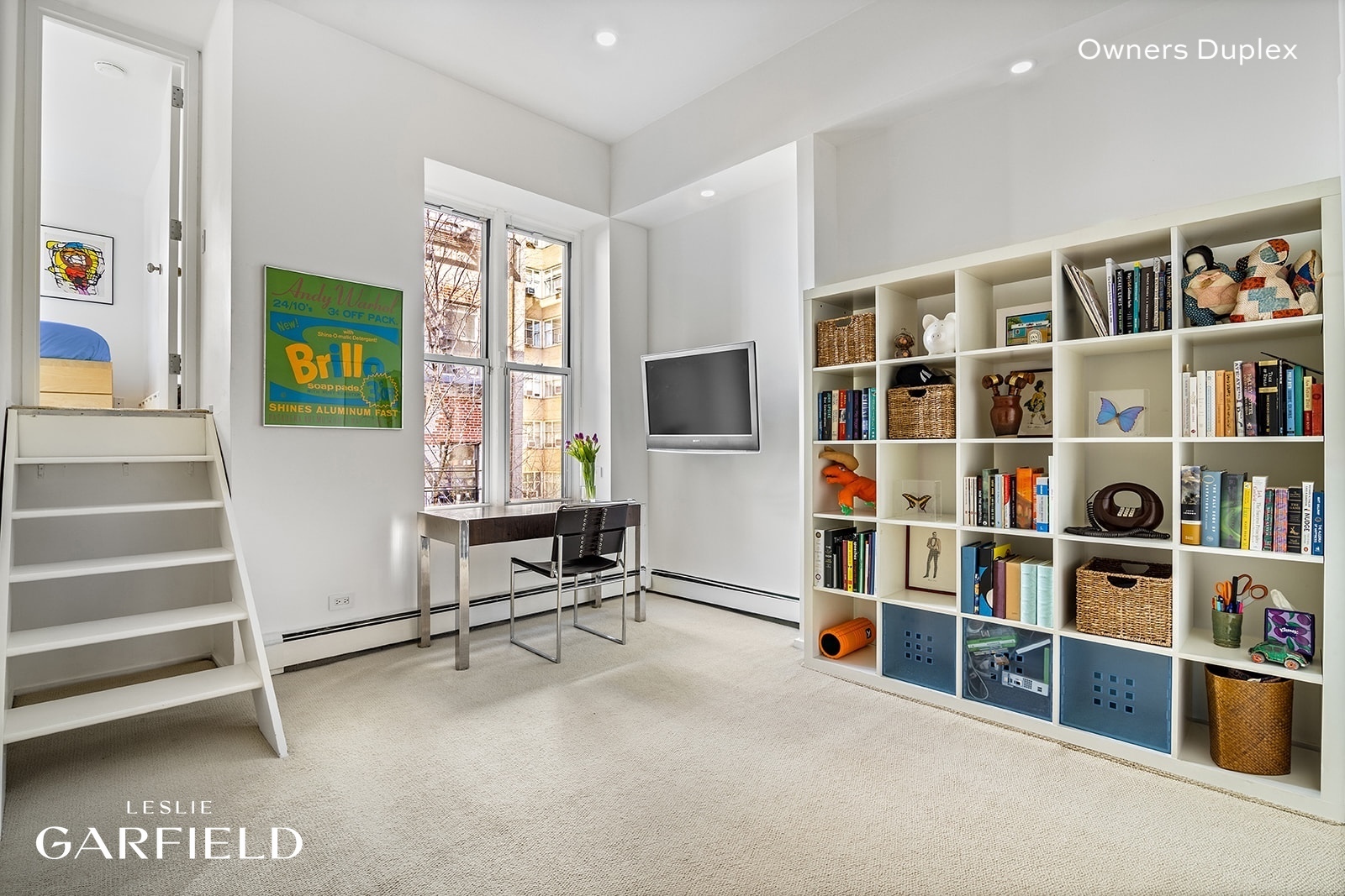 13 West 89th Street Manhattan, NY 10024 - Photo 7 of 17 a view of a livingroom with furniture and staircase