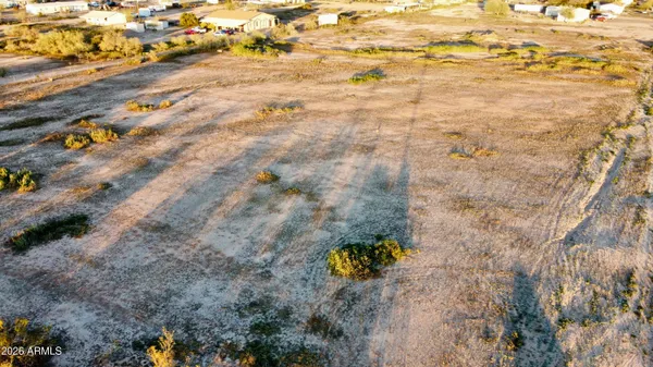 a view of swimming pool with seating area