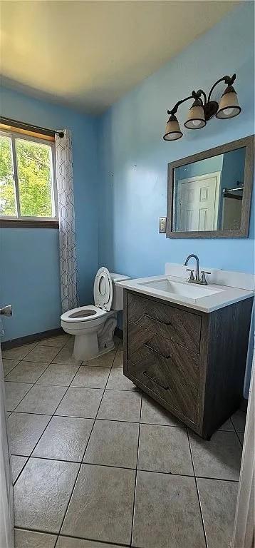 115 North Ray Street New Castle, PA 16101 - Photo 7 of 9 a bathroom with a sink toilet and mirror