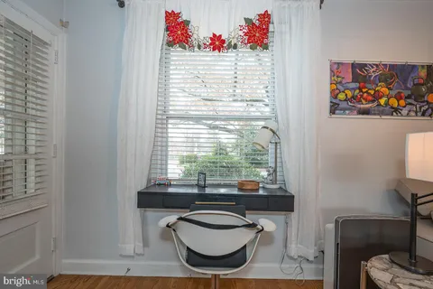 a room with furniture and a window