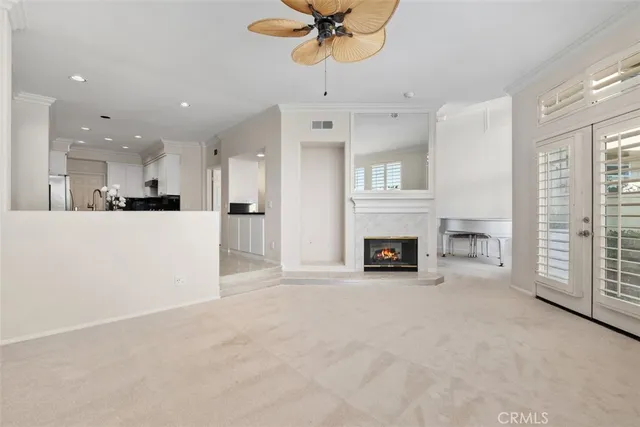 a view of a kitchen with furniture and a fireplace