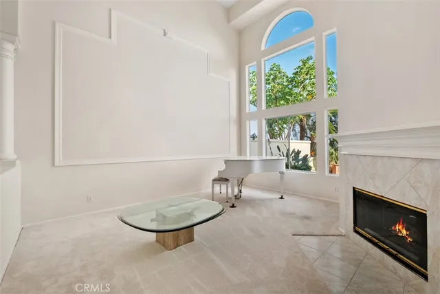 a room with furniture and a fireplace