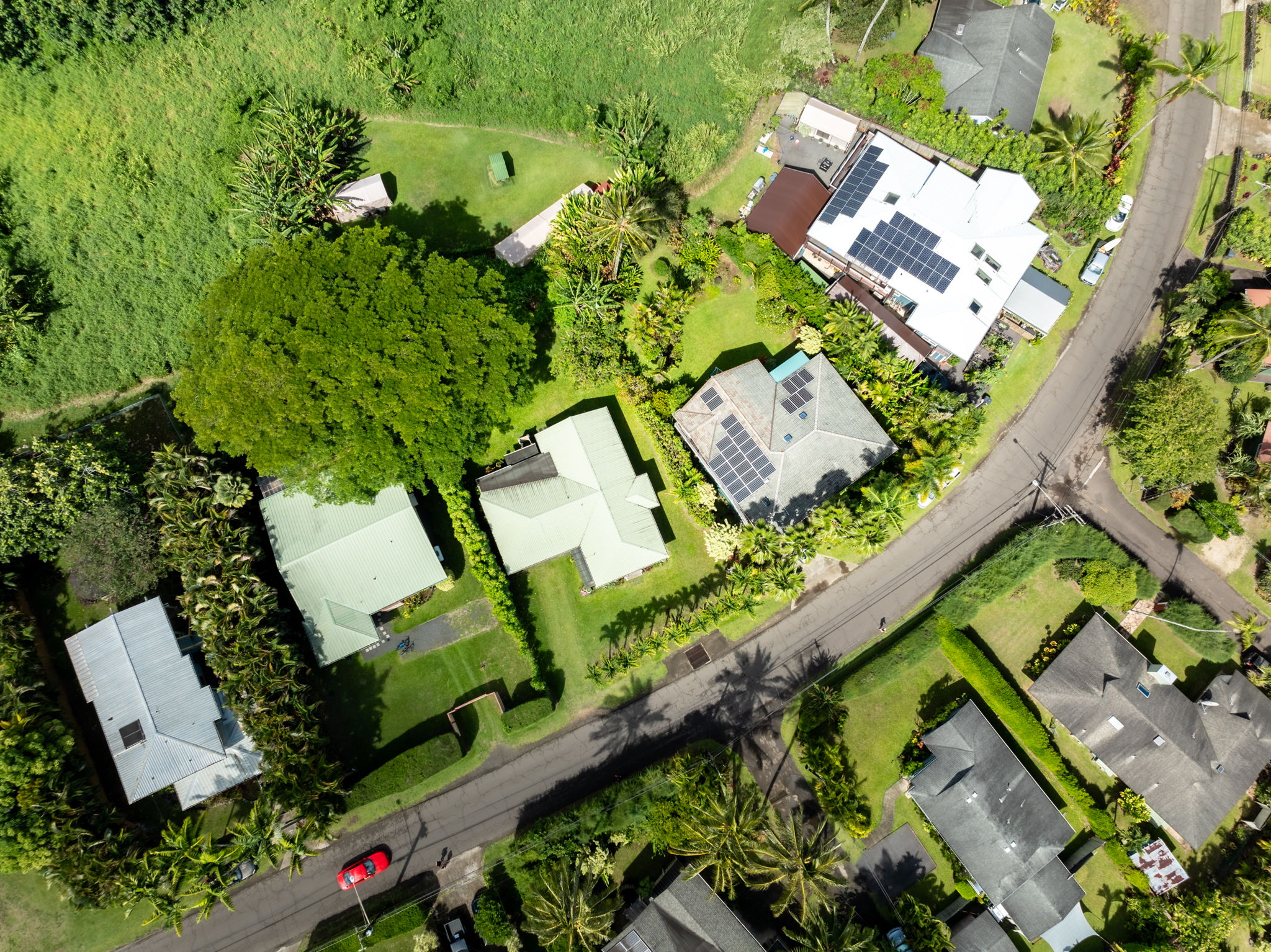 4460 Aku Road Hanalei, HI 96714 - Photo 4 of 30 an aerial view of a house with a yard