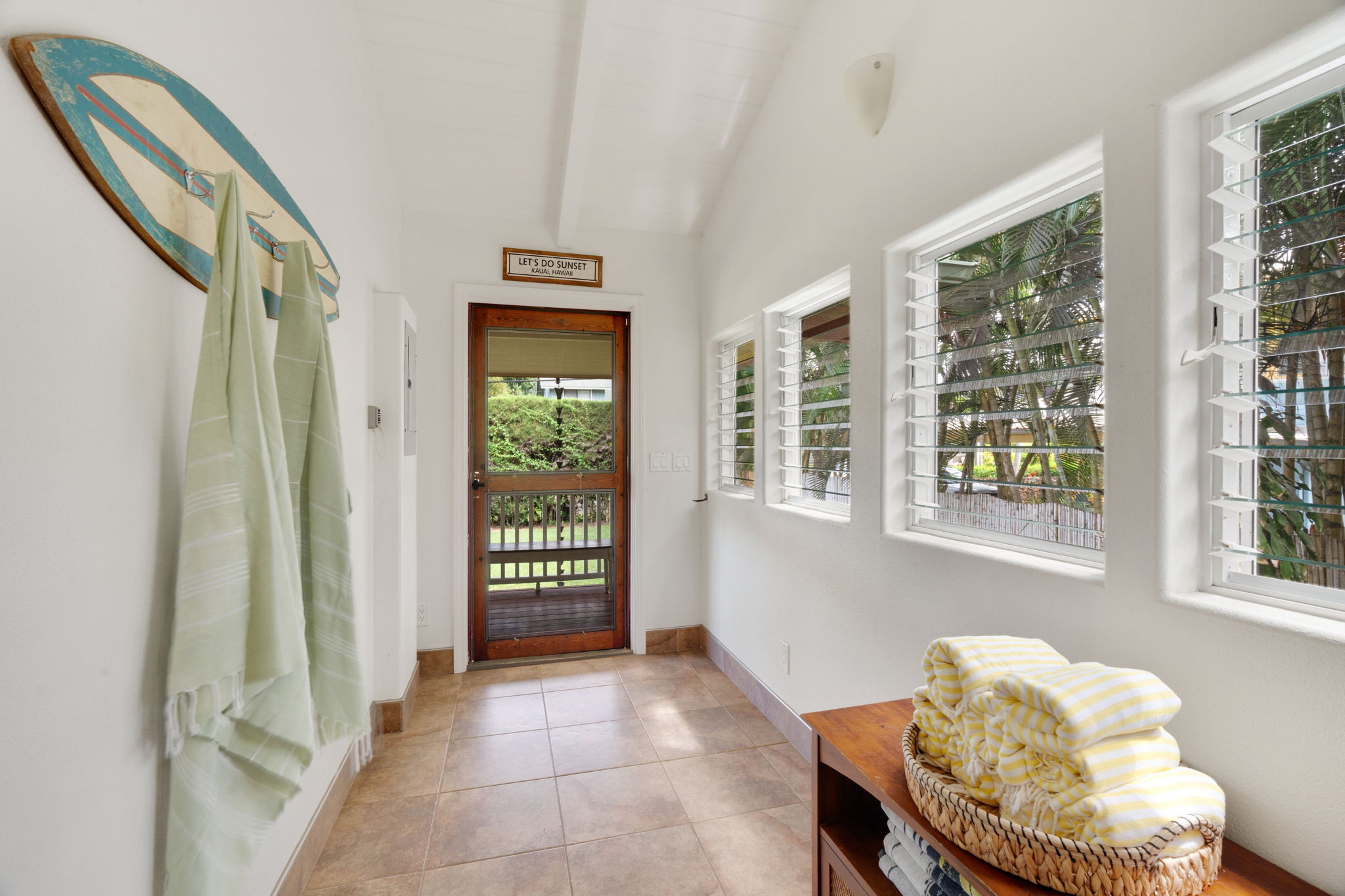 4460 Aku Road Hanalei, HI 96714 - Photo 5 of 30 a living room with furniture and a window