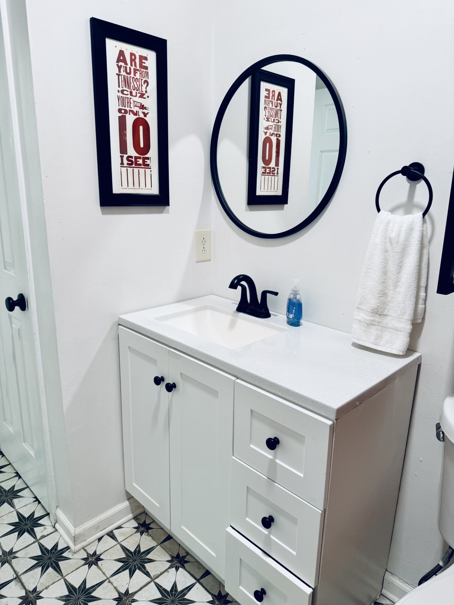 105 Riverside Drive, Unit A Columbia, TN 38401 - Photo 6 of 17 a bathroom with a sink and a mirror