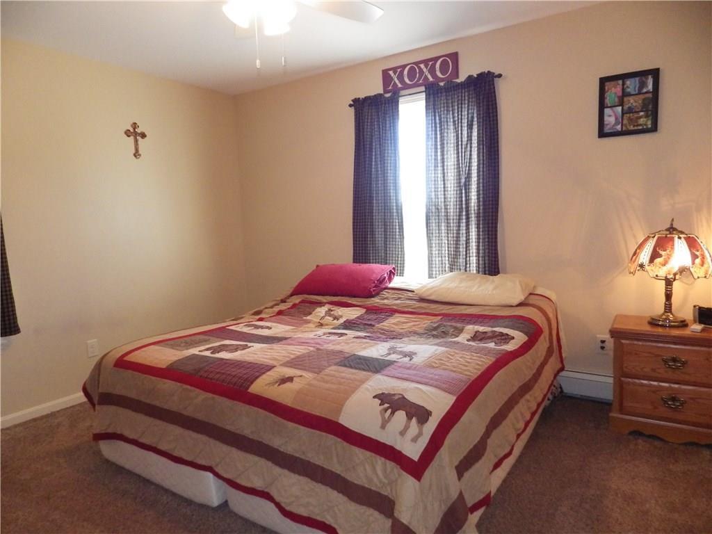 64 Foss Road Rome, ME 04963 - Photo 13 of 27 Master bedroom with full bath.