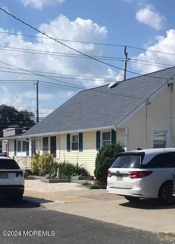 a front view of a house with yard