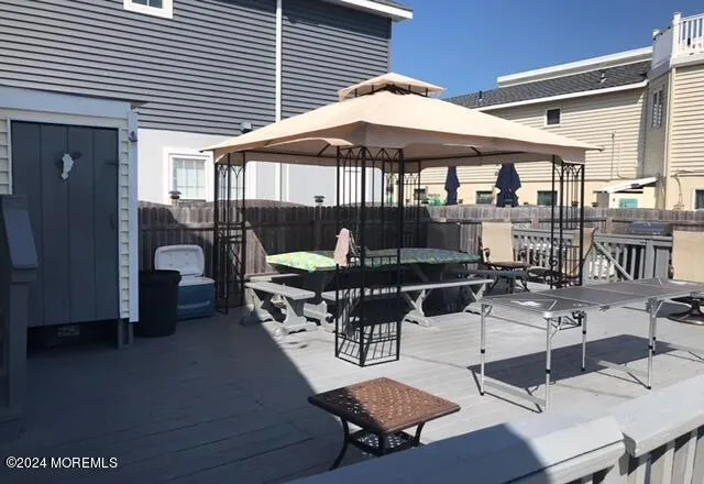 a patio with tables and chairs
