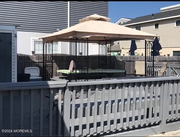a view of a chairs and table in the patio
