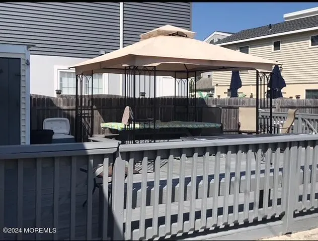 a view of a chairs and table in the patio