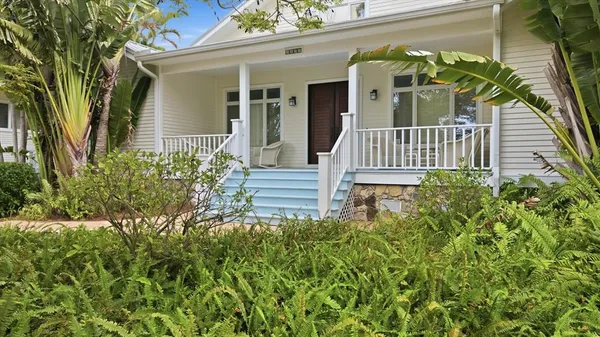 front view of a house with a small yard