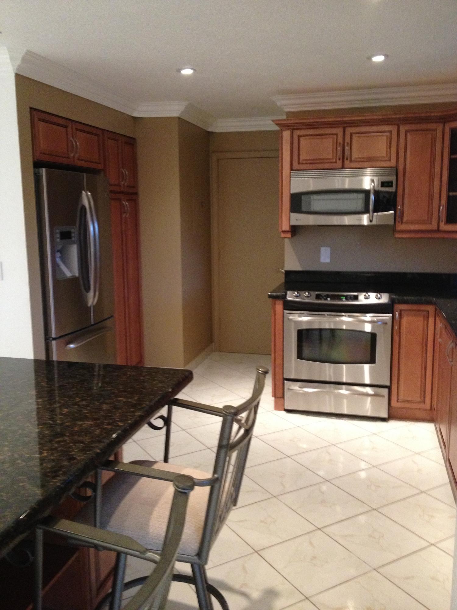 6014 Dusenburg Road Delray Beach, FL 33484 - Photo 10 of 25 entrance to garage from kitchen