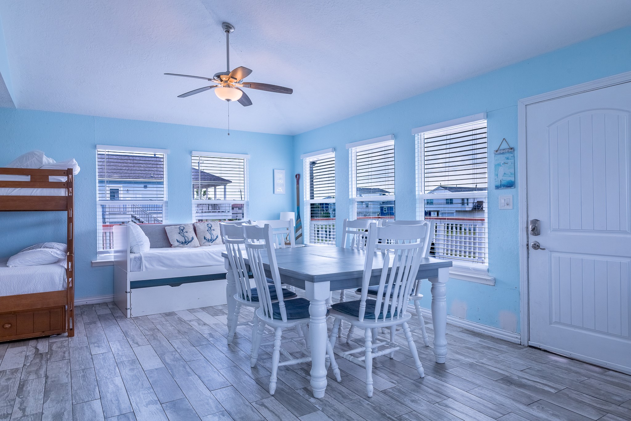 21614 Termini-San Luis Pass Road Galveston, TX 77554 - Photo 11 of 31 a view of a dining room with furniture and wooden floor