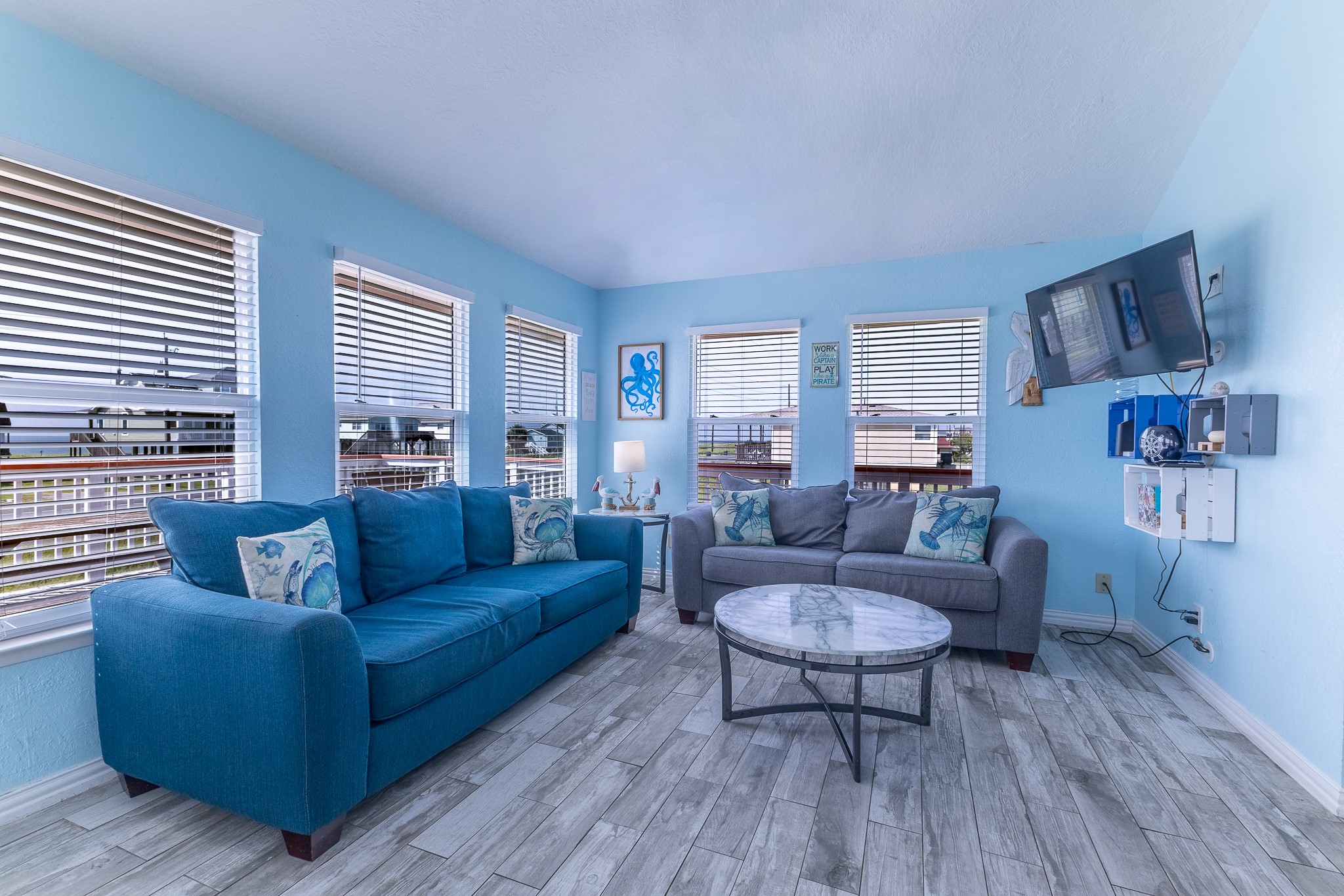 21614 Termini-San Luis Pass Road Galveston, TX 77554 - Photo 14 of 31 a living room with furniture and a large window