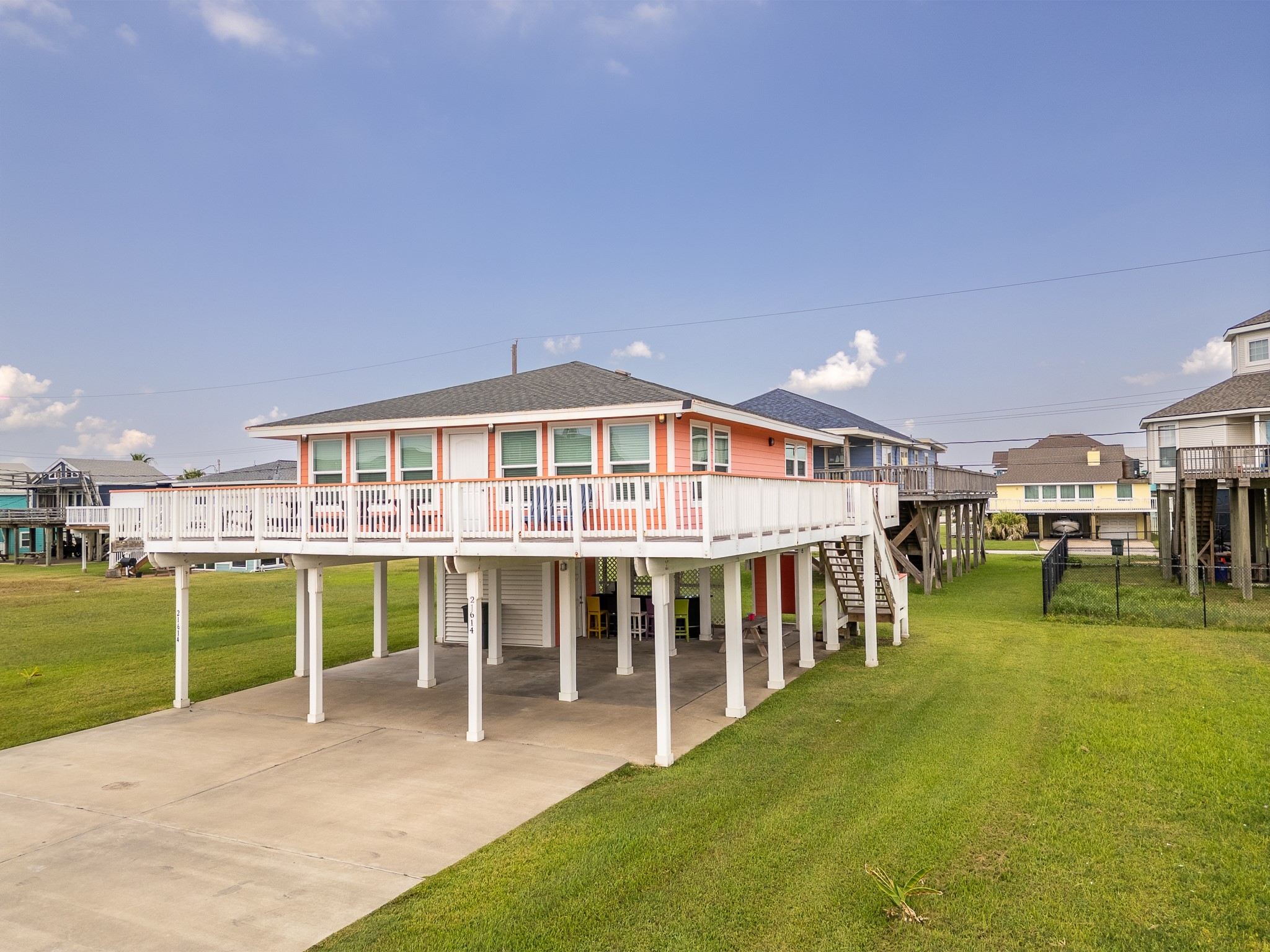 21614 Termini-San Luis Pass Road Galveston, TX 77554 - Photo 2 of 31 a view of a house with a big yard