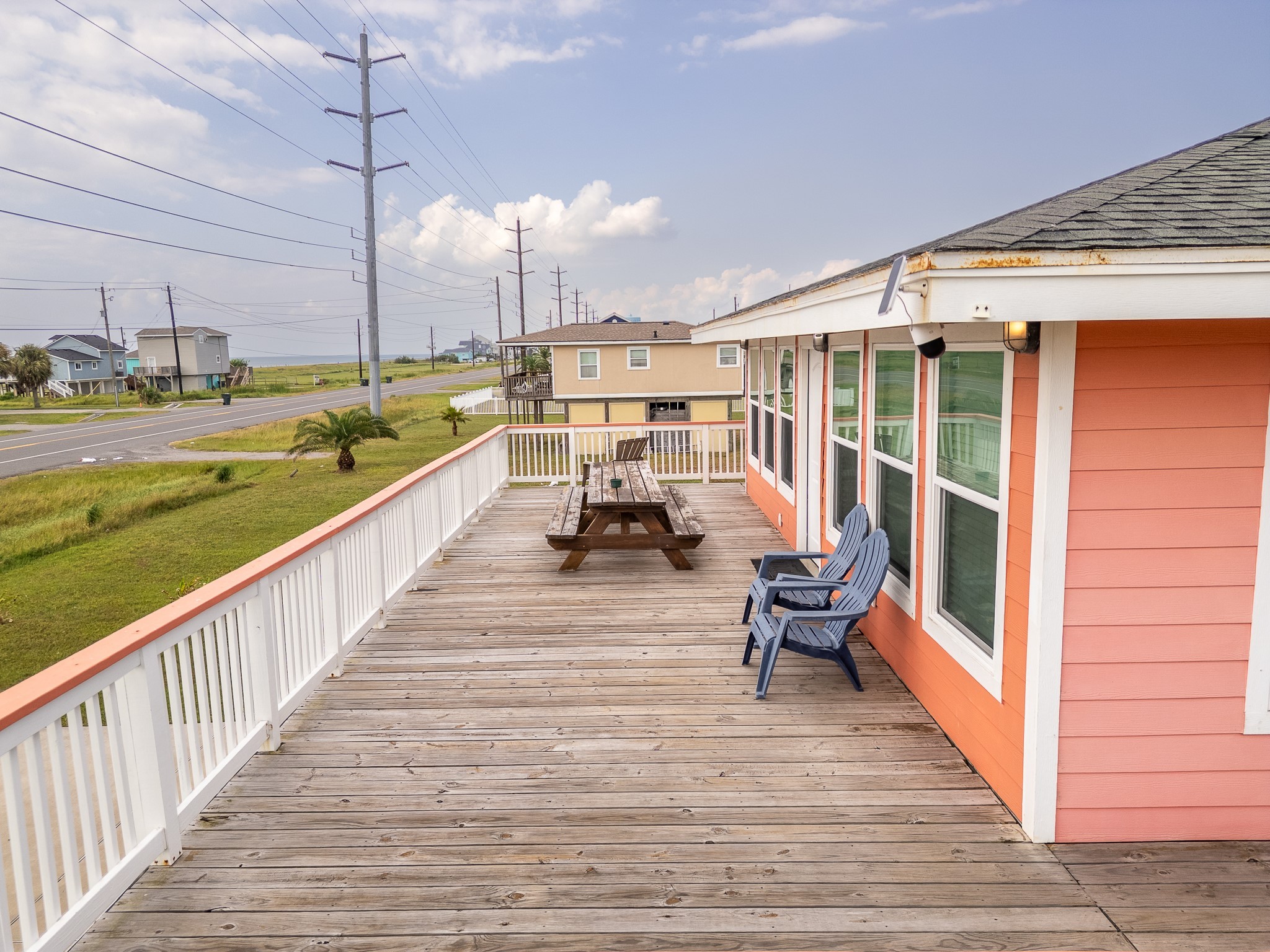 21614 Termini-San Luis Pass Road Galveston, TX 77554 - Photo 26 of 31 a view of a balcony with chairs