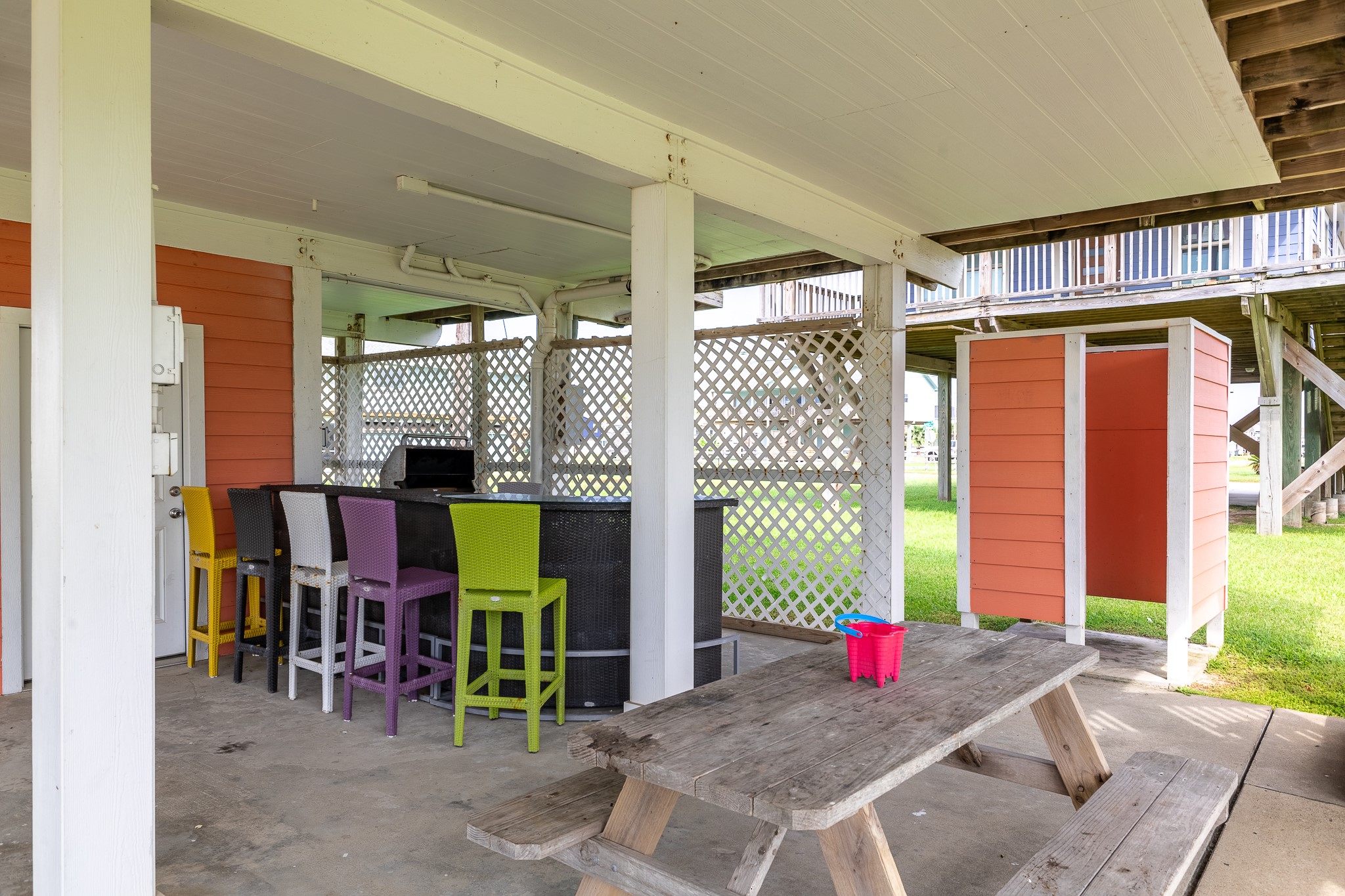 21614 Termini-San Luis Pass Road Galveston, TX 77554 - Photo 28 of 31 a front view of a house with outdoor seating
