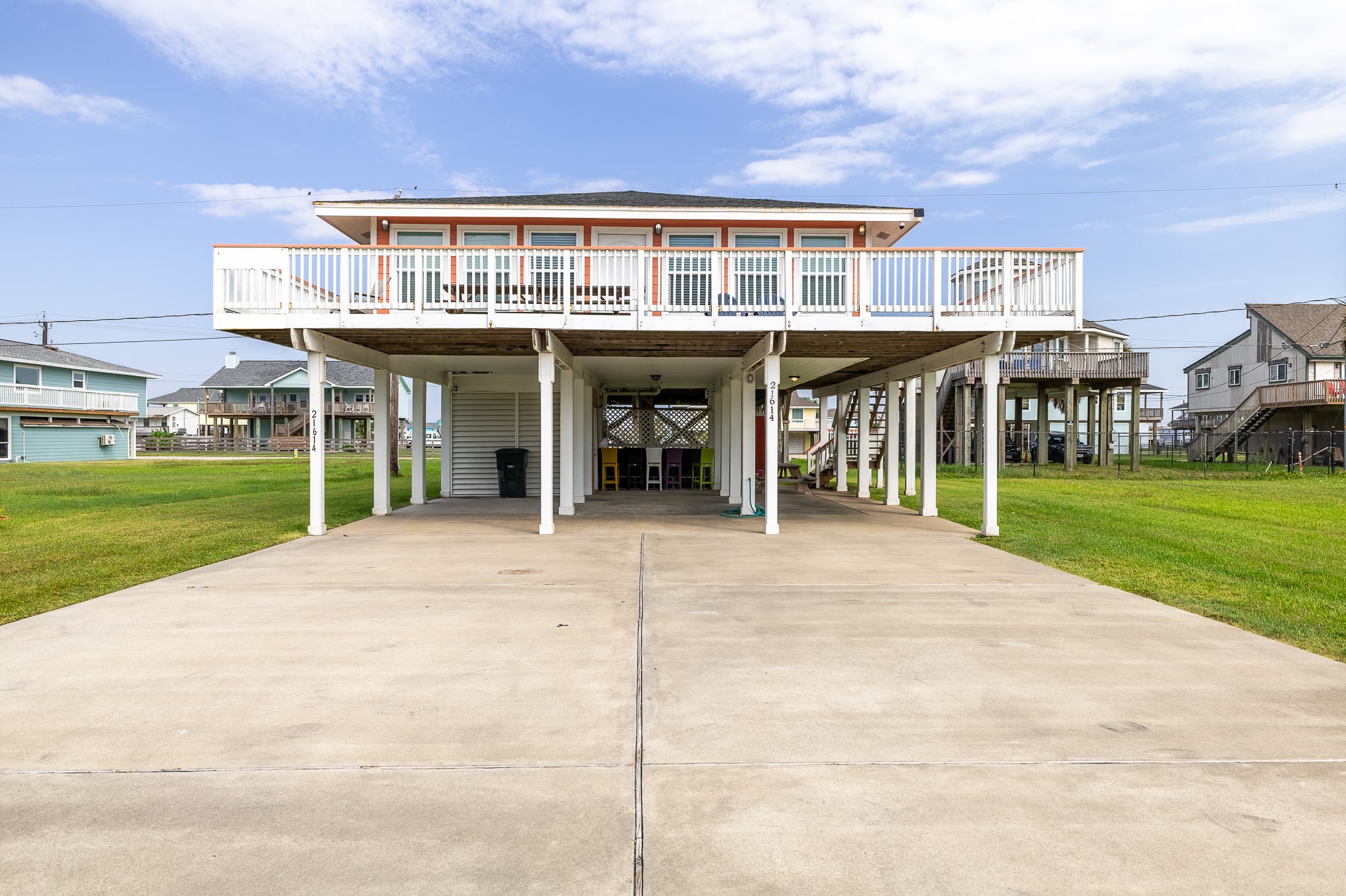 21614 Termini-San Luis Pass Road Galveston, TX 77554 - Photo 31 of 31 a front view of a house with a yard