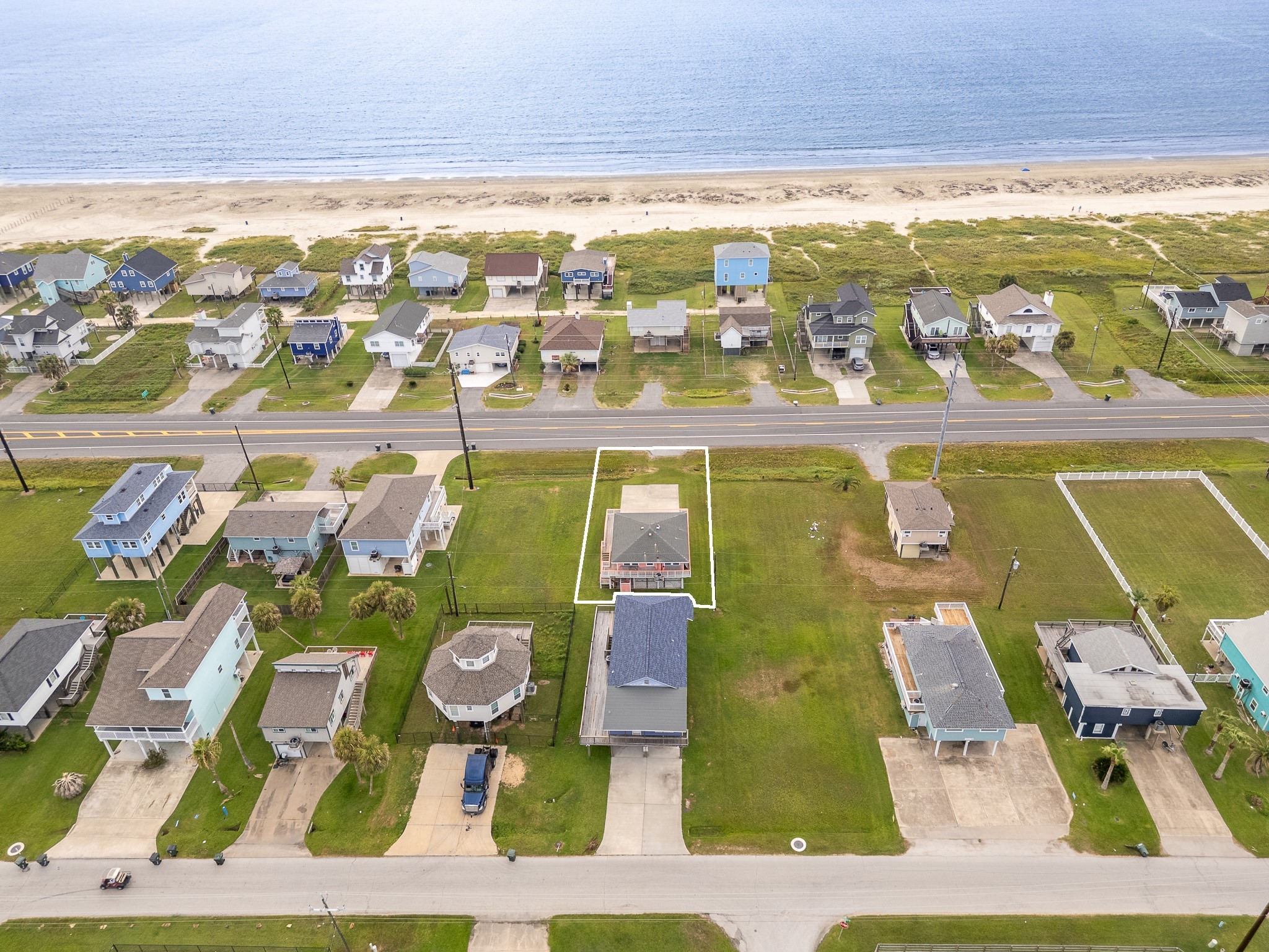 21614 Termini-San Luis Pass Road Galveston, TX 77554 - Photo 8 of 31 an aerial view of residential houses with outdoor space