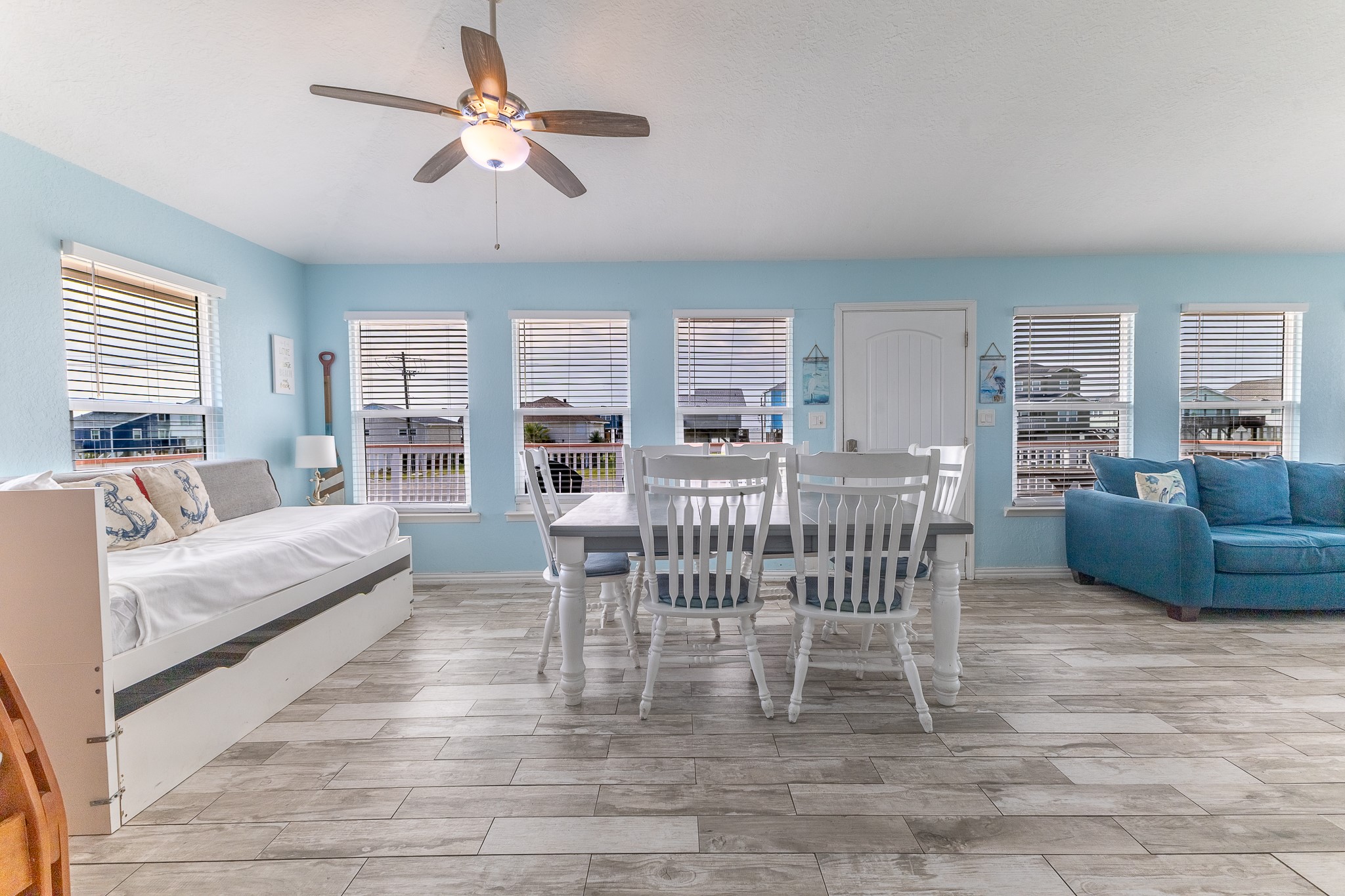 21614 Termini-San Luis Pass Road Galveston, TX 77554 - Photo 10 of 31 a living room with furniture and a large window