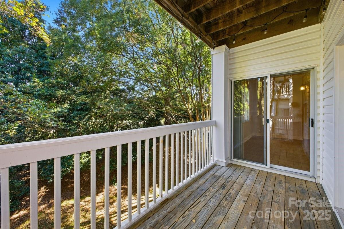 5617 Fairview Road, Unit 6 Charlotte, NC 28209 - Photo 30 of 38 a view of balcony with wooden floor