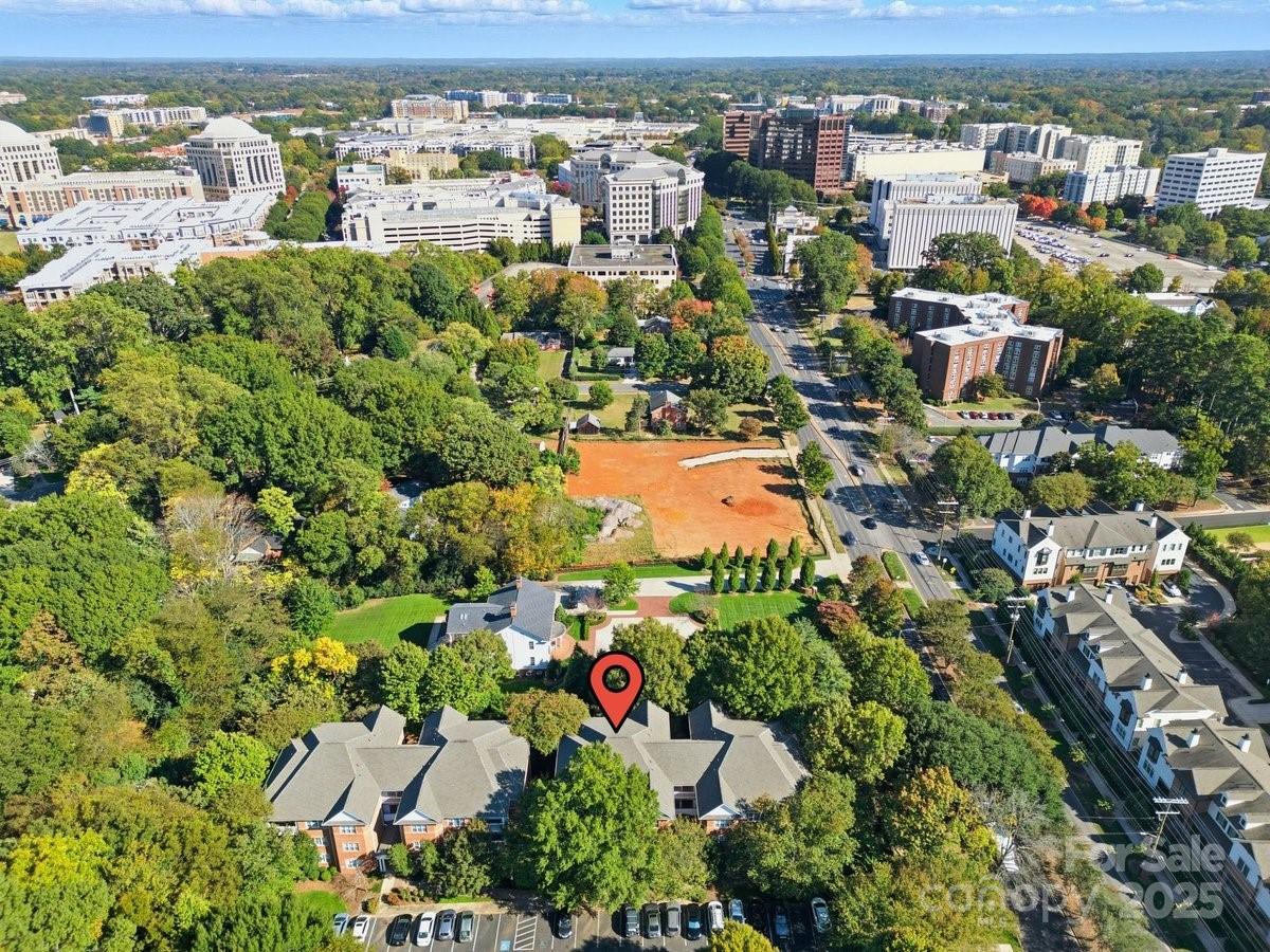 5617 Fairview Road, Unit 6 Charlotte, NC 28209 - Photo 4 of 38 an aerial view of residential houses with outdoor space