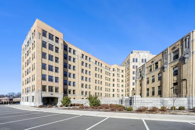 a view of a building and a street