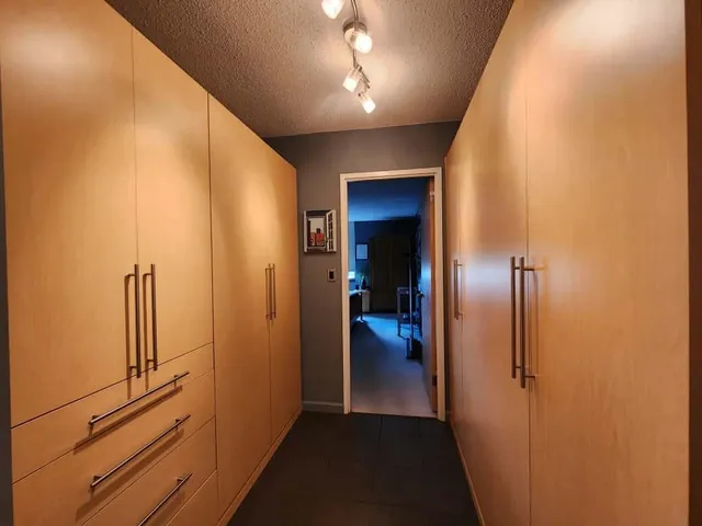 a bathroom with a sink double vanity and a mirror