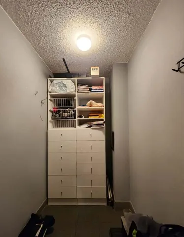 a view of a kitchen with a sink