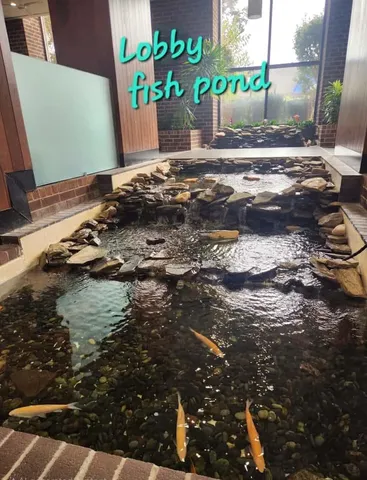 a bed room with furniture and a window