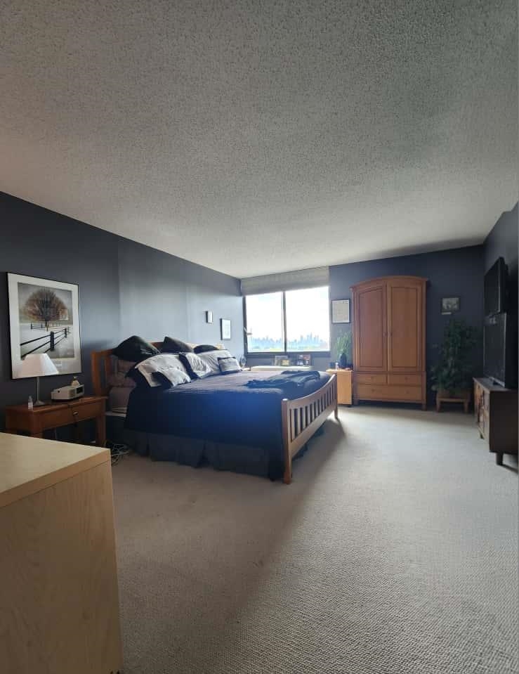 770 Anderson Avenue, Unit 14P Cliffside Park, NJ 07010 - Photo 27 of 33 a bed room with furniture and a window