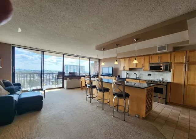 a group of people sitting in a living room