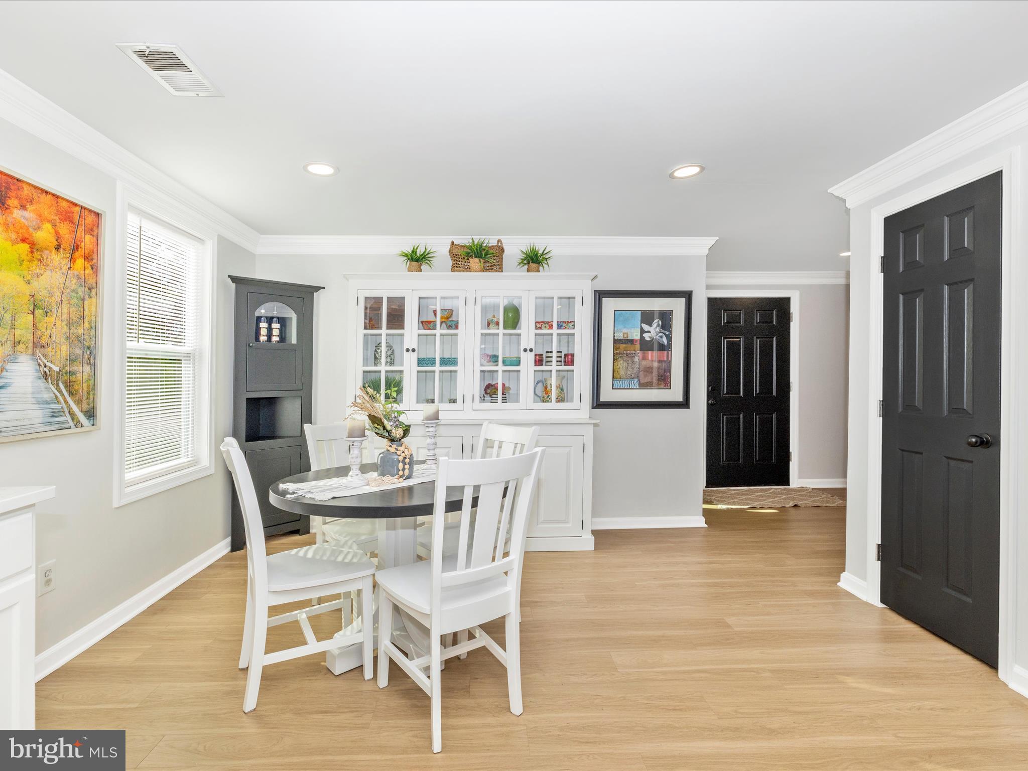 1410 Woodenbridge Lane Mount Airy, MD 21771 - Photo 11 of 50 a dining room with furniture and window